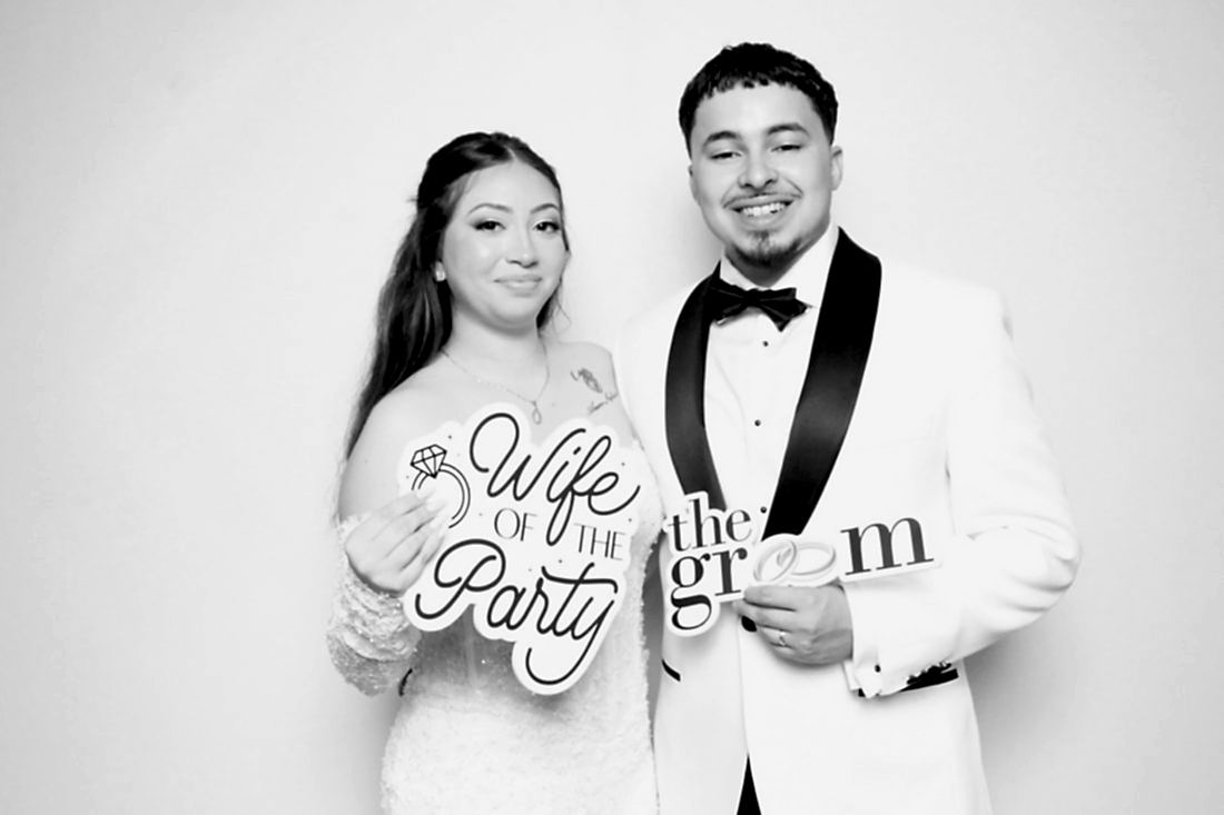 Bride and groom at the photo booth